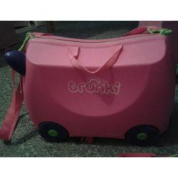 Trunki kids pink ride on suitcase