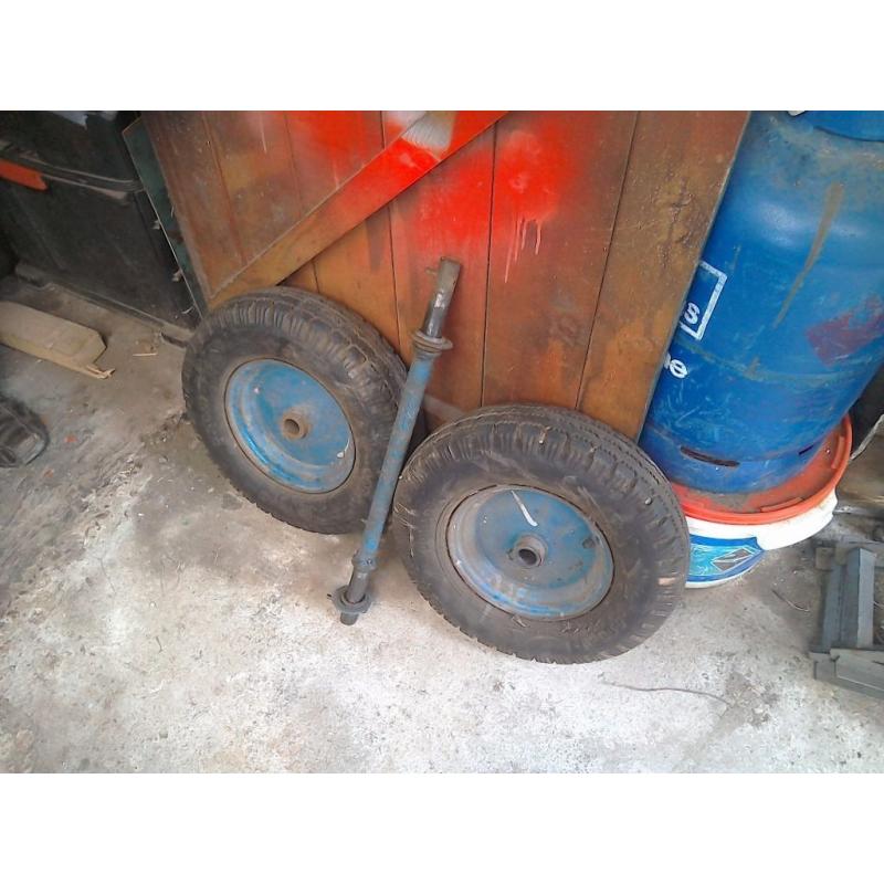 Two wheels 400 x 8 good condition with axle