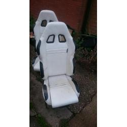 White leather bucket seats