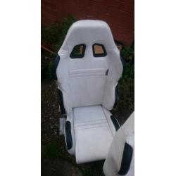 White leather bucket seats