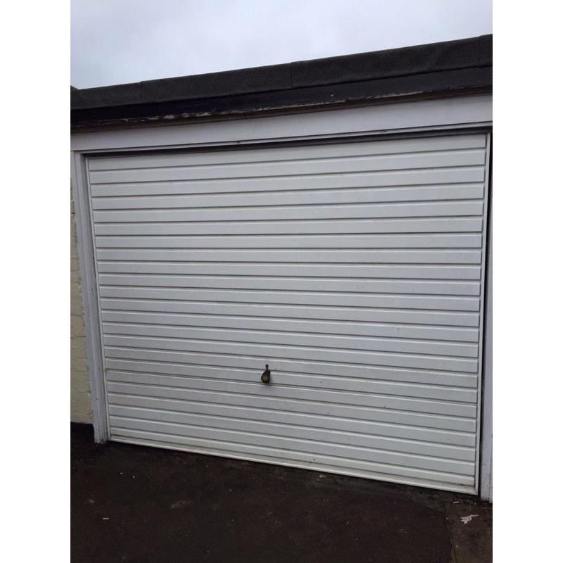 HORMANN White metal up and over garage door.