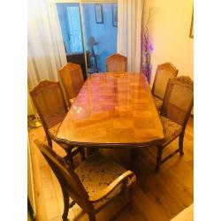 Immaculate wooden dining table & six chairs